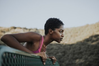 Woman Holding Steel Handrail