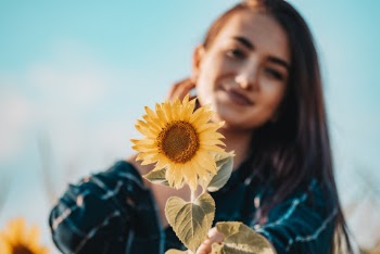 Woman Holding Sunflower