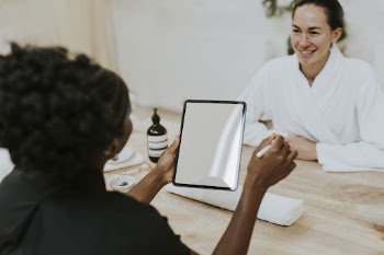 Woman holding tablet with black | Free Photo - rawpixel