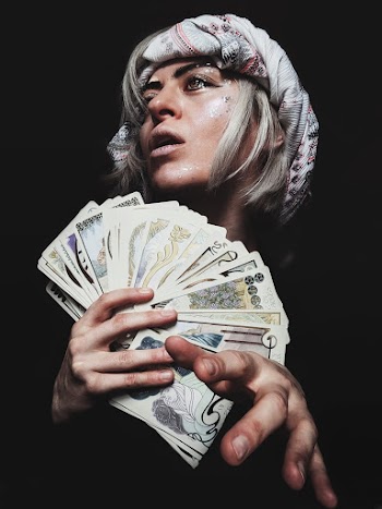 Woman Holding Tarot Cards