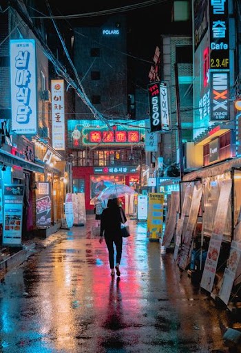 woman holding umbrella