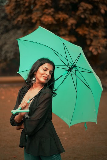 Woman Holding Umbrella