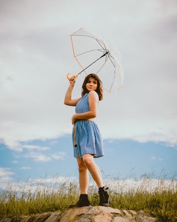 Woman Holding Umbrella