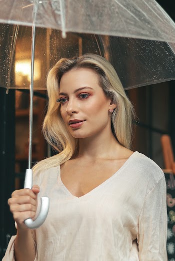 Woman Holding Umbrella