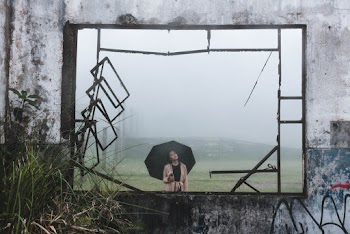 Woman Holding Umbrella