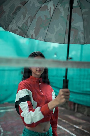 Woman Holding Umbrella