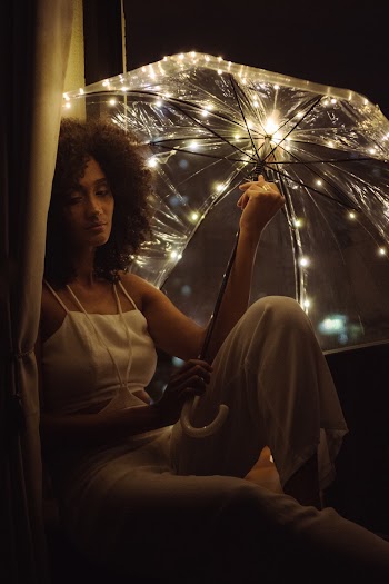 Woman Holding Umbrella