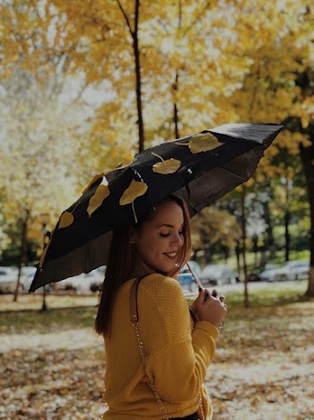 Woman Holding Umbrella