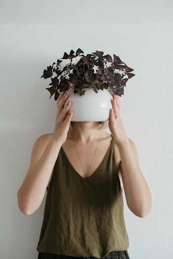 Woman Holding Vase