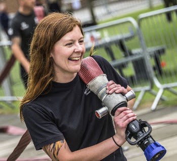 Woman holding water hose, June | Free Photo - rawpixel