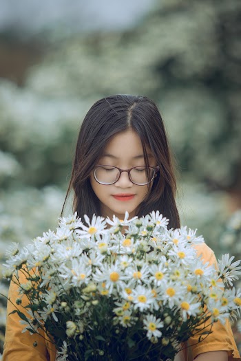 Woman Holding White Bouquet