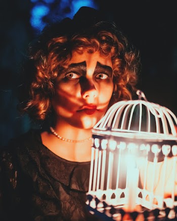 Woman Holding White Candle Lantern