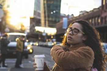 Woman Holding White Drinking Cup
