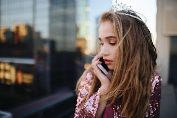 Woman Holding White Iphone