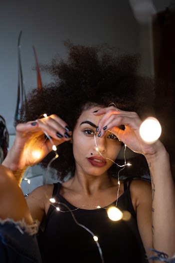 Woman Holding White Led Light Strings