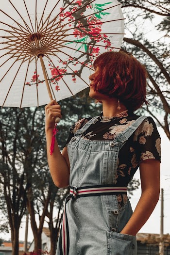 Woman Holding White Umbrella