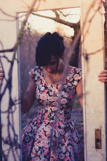 Woman Holding White Wooden 1-lite Door