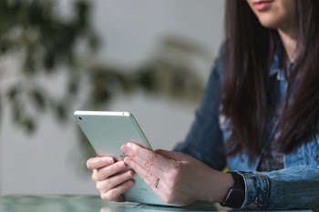 Woman Holds Ipad