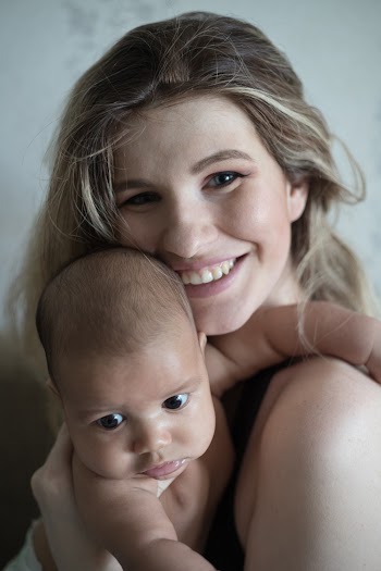 Woman Hugging Baby