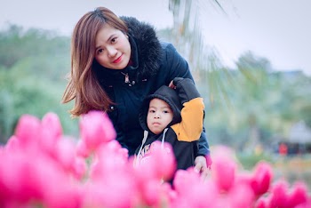 Woman Hugging Child
