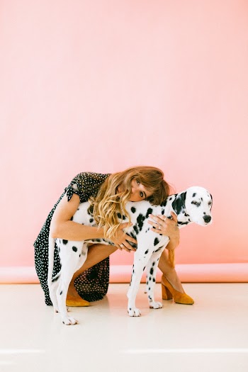 Woman Hugging Dalmatian