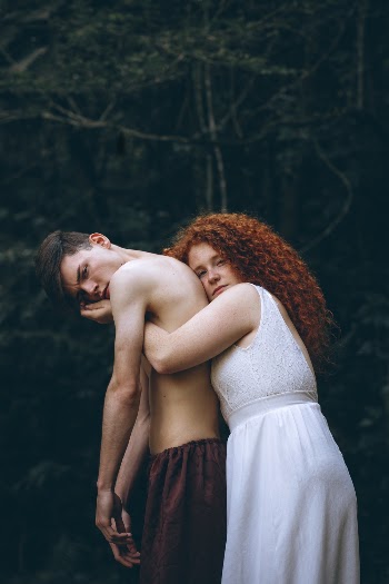 Woman Hugging Man