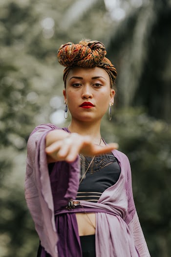 Woman in a Black and Violet Dress
