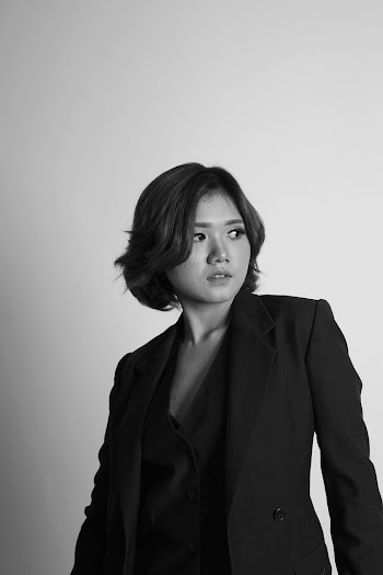 Woman in a Black Suit