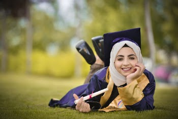 Woman in a Blue Graduation Toga