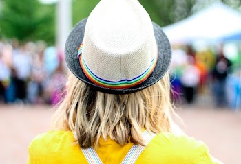 Woman in a Gray Fedora and Yellow Shirt