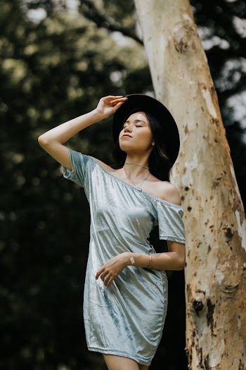 Woman in a Gray Off-shoulder Dress