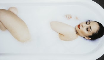 Woman In A Tub