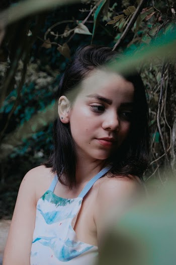 Woman in a White and Blue Top