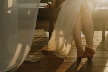 Woman In Barefoot With Textile On Her Legs