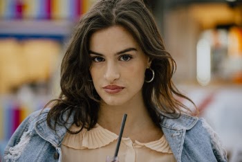 Woman in Beige Top