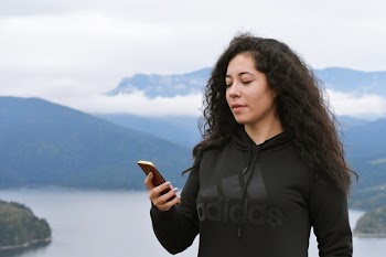Woman in Black Adidas Pullover Hoodie