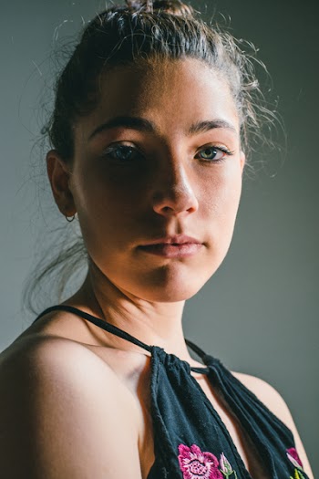 Woman in Black and Gray Floral Halter Top