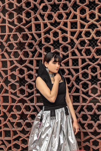 Woman in Black and Gray Sleeveless Dress