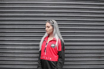 Woman In Black And Red Jacket 