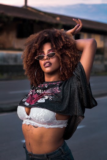 Woman in Black and White Crop Top and White Lace Bra 