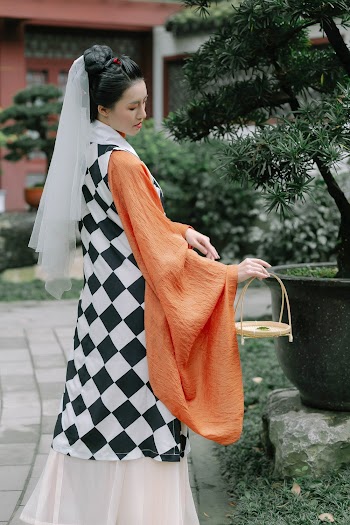 Woman In Black And White Dress