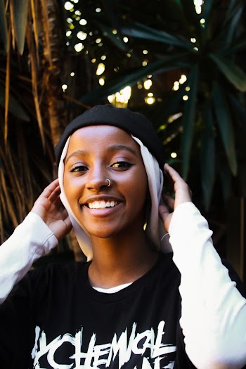 Woman in Black and White Shirt