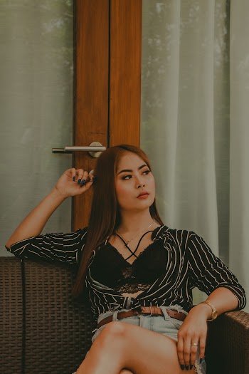 Woman in Black and White Striped Long-sleeved Dress