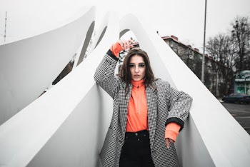 Woman in Black and White Tattersall Coat