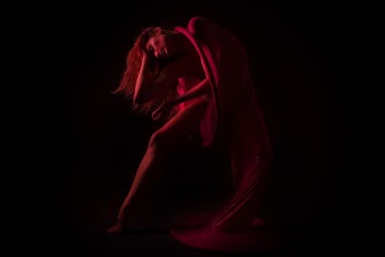 Woman In Black Background