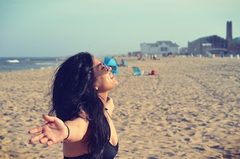 Woman in Black Bra at Beach