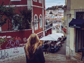 Woman in Black Cardigan Standing Near Concrete Stais