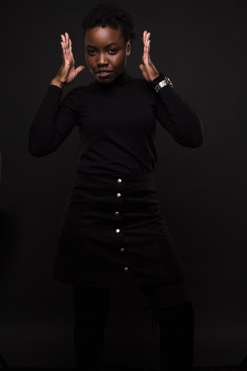 Woman in Black Dress Raising Her Hands