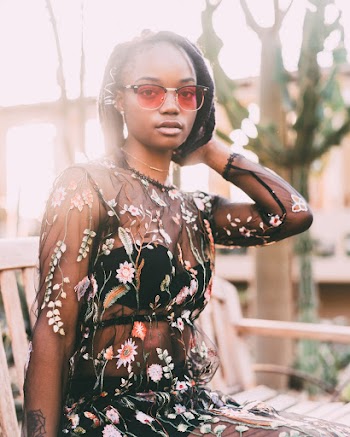Woman in Black Floral Lace Top