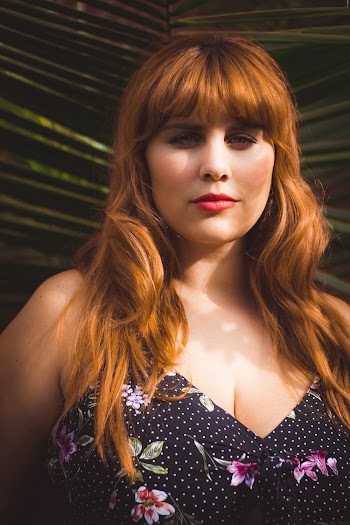 Woman In Black Floral Top